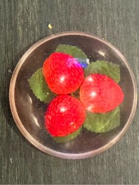 Vintage Lucite paperweight, red strawberries and green leaves